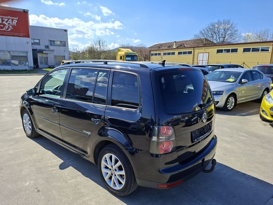 VW Touran, an 2010,1400 benzină, 140 cp,euro 5