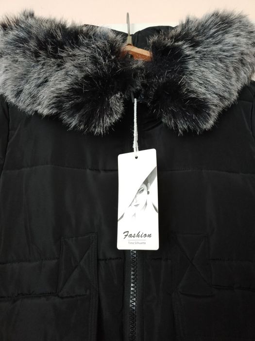 Продаю новый теплый пуховик