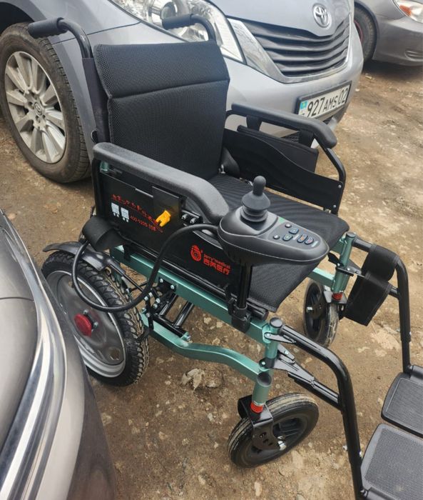 Электрическая инвалидная коляска