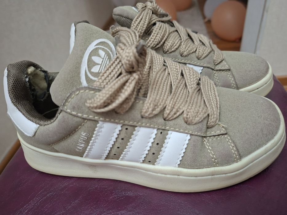 Кроссовки сатамын