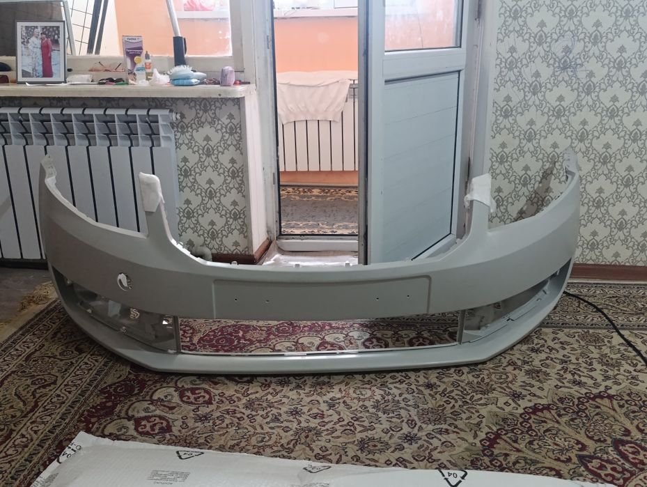 Китайский бампер для шкода А семь 2013 года