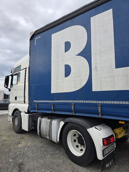 Man TGX 18.440 + Schmitz 2012
