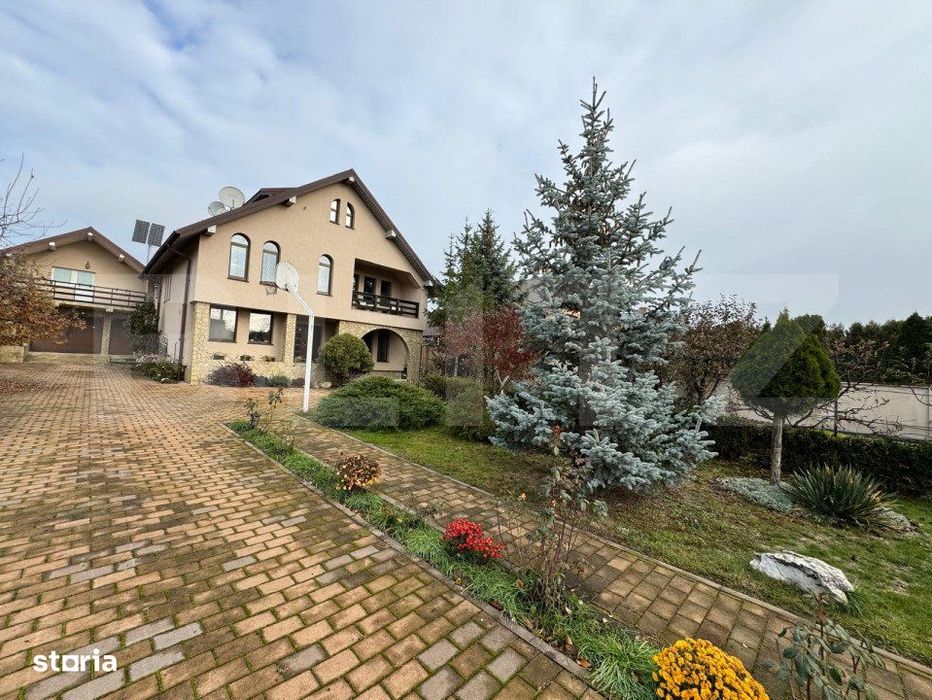 Casa impresionanta , 250 mp , cu gradina generoasa 1000 mp , Scheia