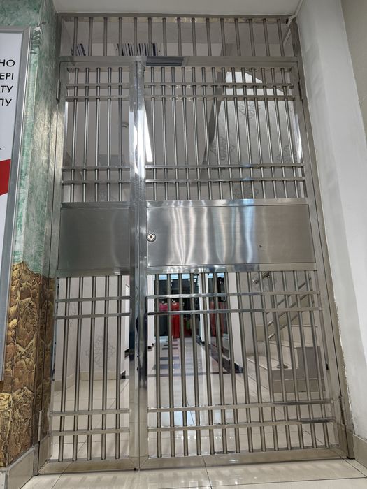 Дверь из оценкованный металла