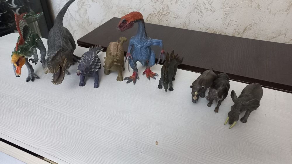 Детские игрушки динозавры .