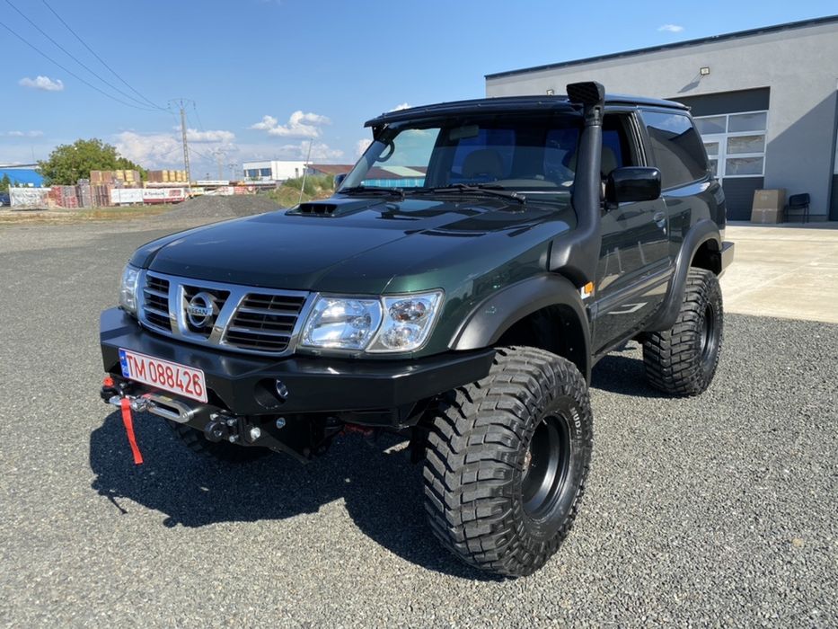 Bara fata Nissan Patrol Y61 cu suport de troliu
