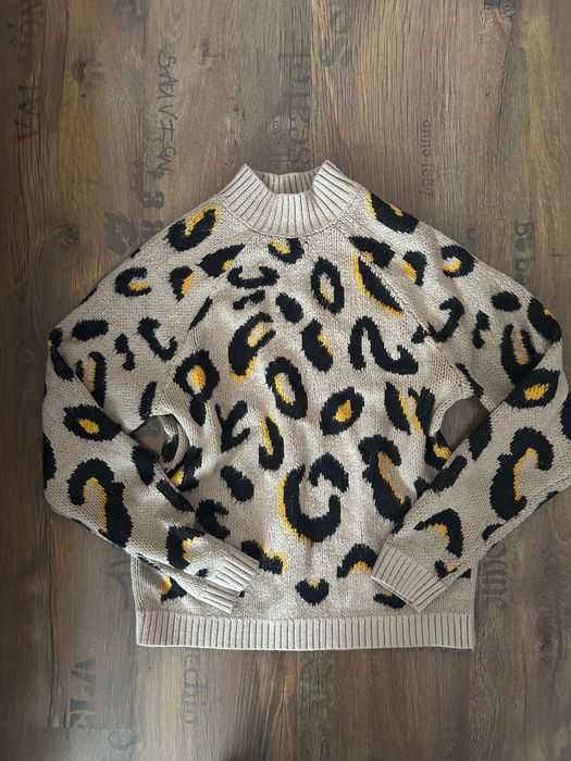 Дамски блузи и пуловери