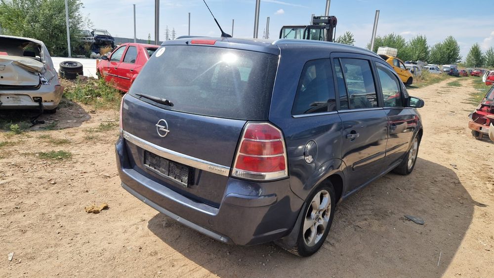 Opel zafira motor cutie faruri capota bara aripa aripi far usi usa portbagaj hayon oglinda scaune interior armatura volan stop stopuri roti jante