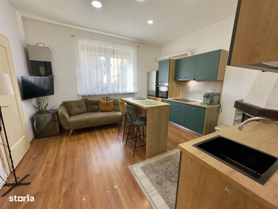 Apartament la casă – 76 mp + terasă + curte + pod mansardabil