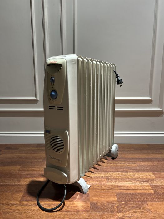 Электрический масляный радиатор( европейское качество-Италия)