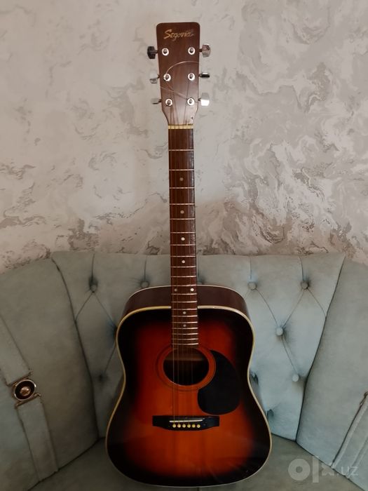 Gitara akustika yangi