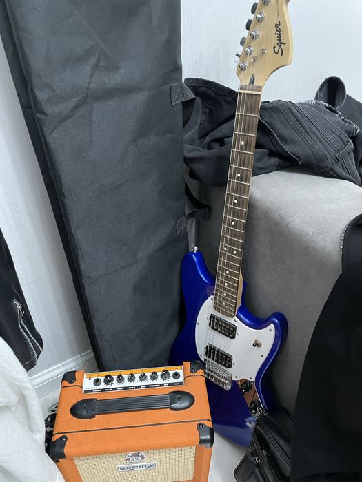 Электрогитара и комбоусилитель