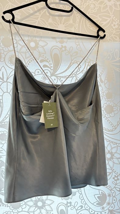 Светло син потник с блестящи презрамки