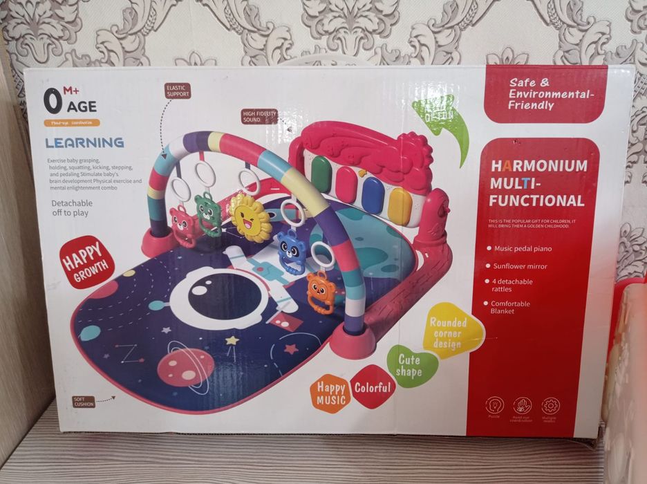 Музыкальный коврик и развивающая дуга