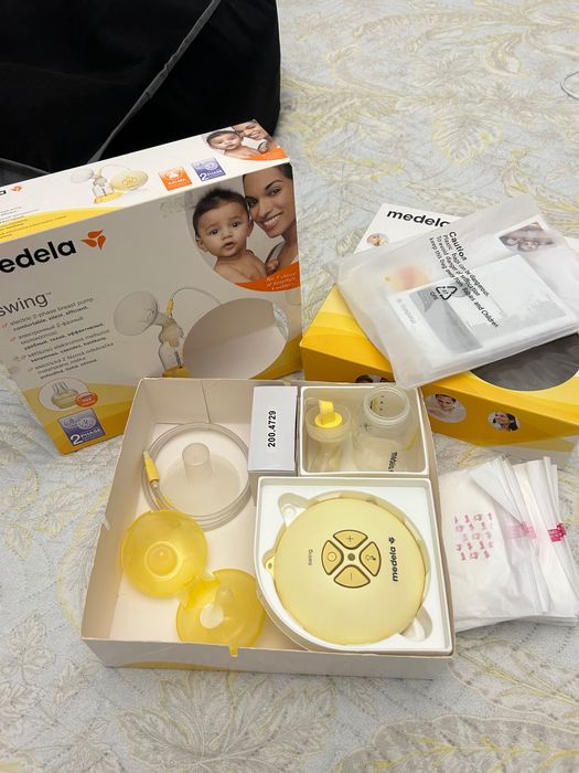 Молокоотсос Medela б/у