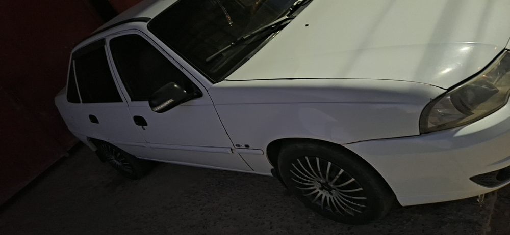 Nexia 2 gibrid sotiladi gaz metan 380.000 yurgan