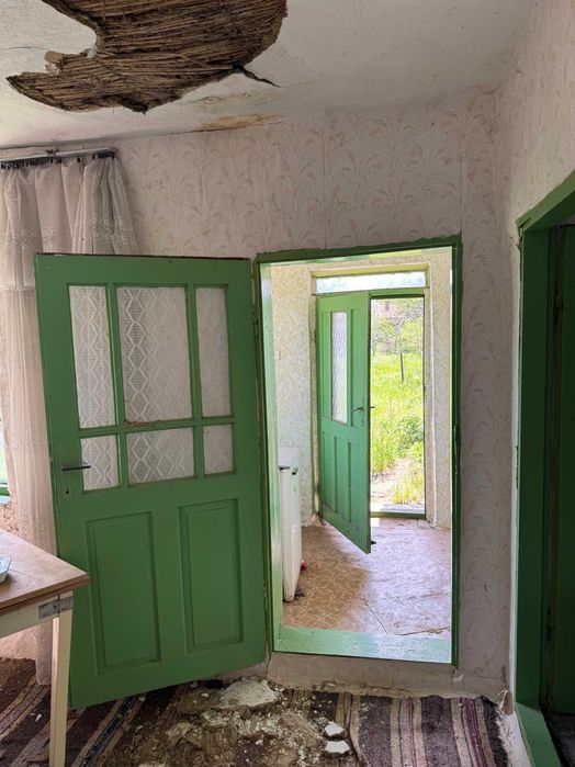 Къща с голям двор 1900 кв.м. парцел земя в регулация в село Александрия община Крушари област Добрич