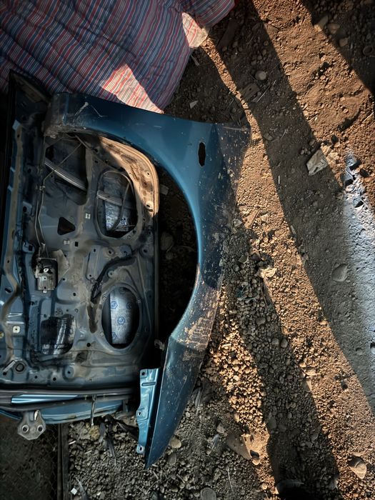 Есік және крыло мазда323