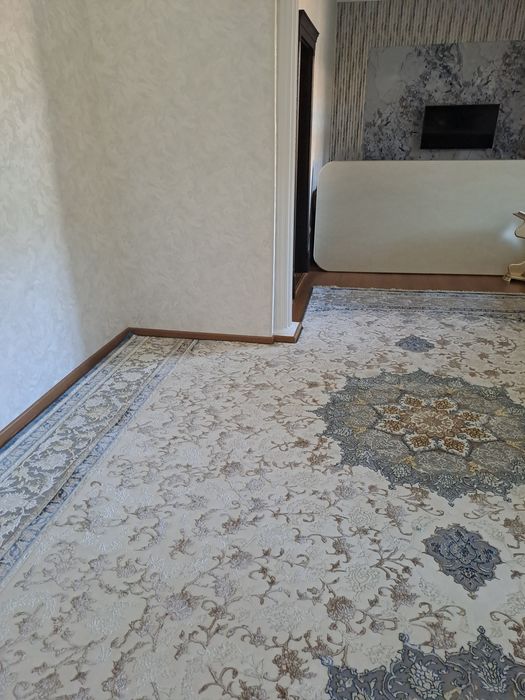 Gilam kesish va tikish