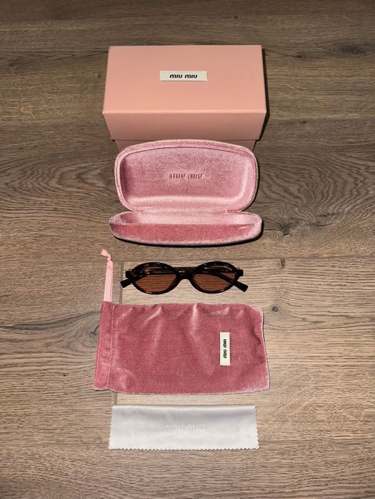 Нови Miu Miu Regard tortoiseshell-effect sunglasses