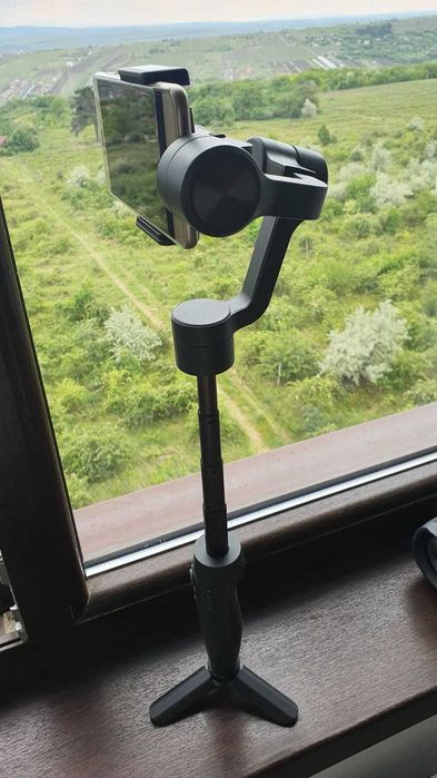 Stabilizator Ghimbal telefon, Feiyu-Tech, 3 axe, pentru stabilizare foto si video, cu braț telescopic și trepied, ca NOU