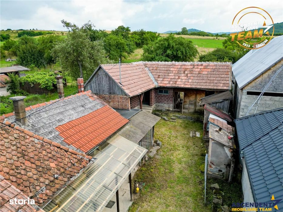 Casa din caramida cu 1.087 mp teren, pozitie centrala, utilitati la po