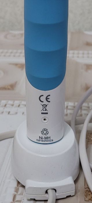 Электрическая зубная щётка