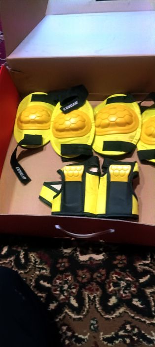 Коньки роликовые