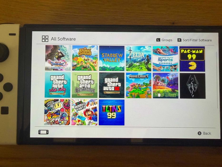 Nintendo Switch OLED White + 512GB + 12 игри + Допълнителни Joy-Con