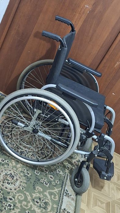 Инвалидная коляска