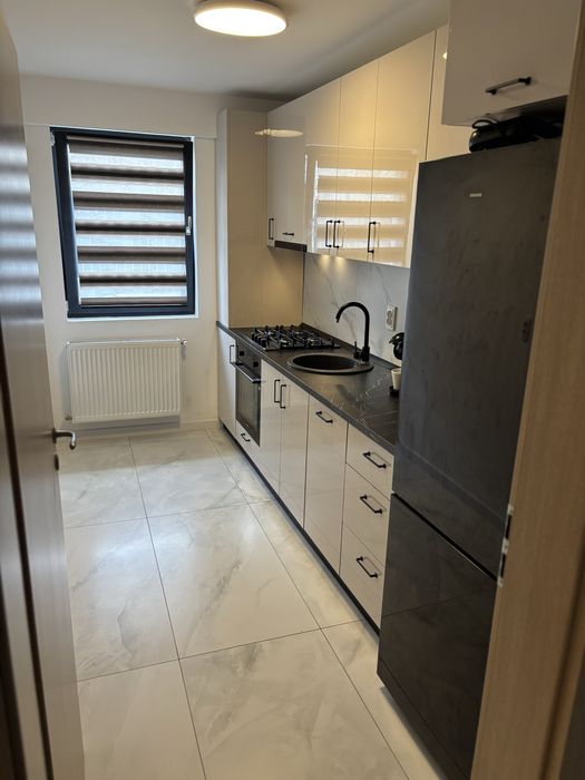 Vand apartament sectorul 5,targ pucheni,2 camere,decomandat,curte