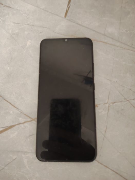 Моб телефон риалми