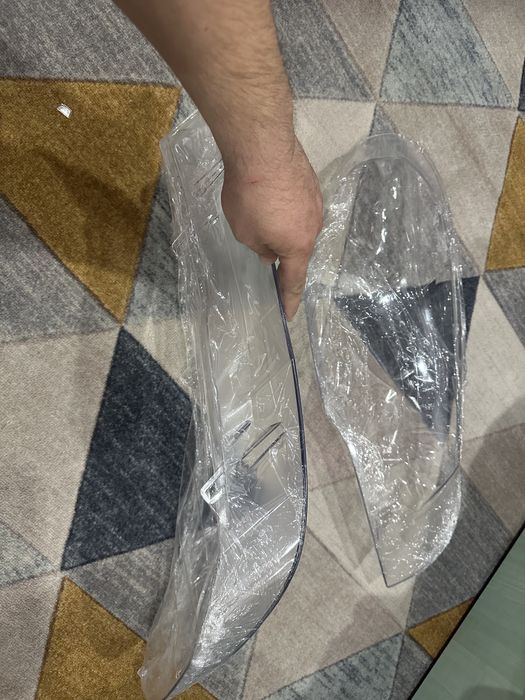 Стекла фар bmw e70