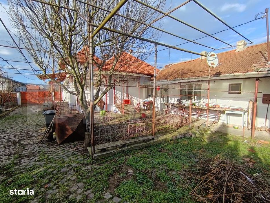 Casa cu 3 camere si un teren in suprafata de 900 mp