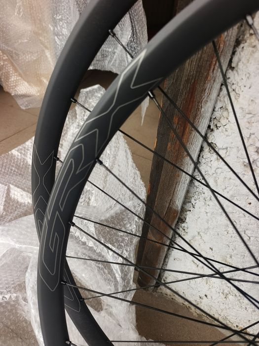 Капли Гравел Shimano GRX WH-RX570-TL Wheelset-12x100mm | 12x142mm - HG