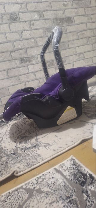 Bolalar uchun avtokreslo.