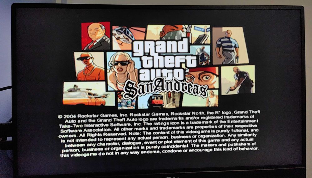 Playstation 2 model slim,modat, cu 33 jocuri de top ,maneta ,cabluri