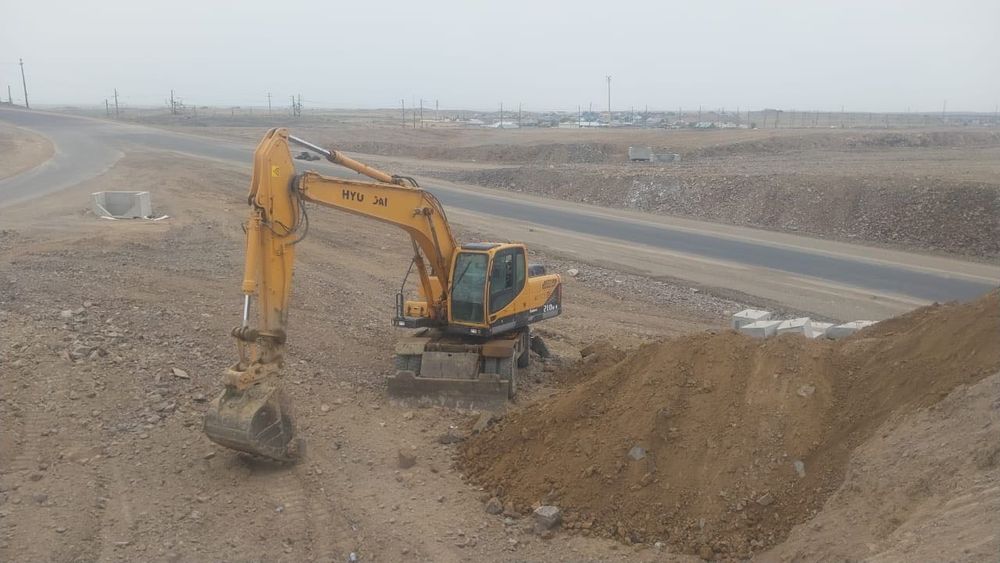 Услуги колесного экскаватора