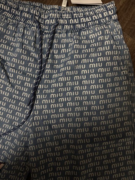 **Дънки MIU MIU**