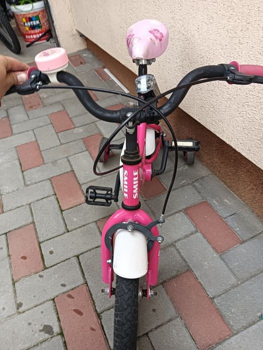 Vând bicicleta pentru copii roz