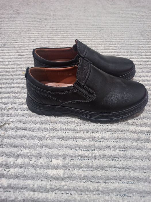 Продам новые туфли