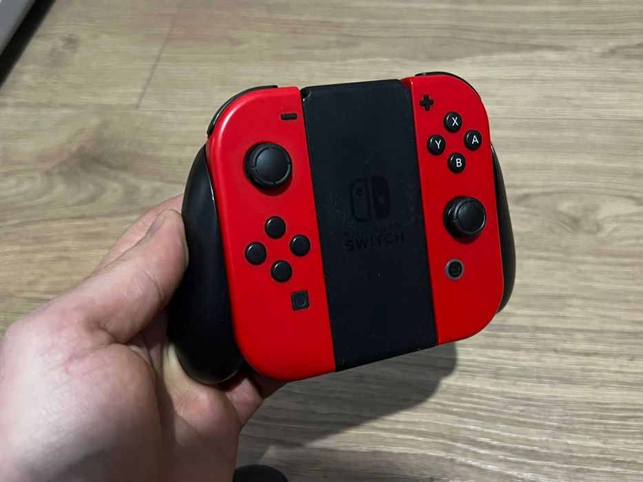 Joycon Nintendo switch+grip 100% original Nintendo,perfect functional