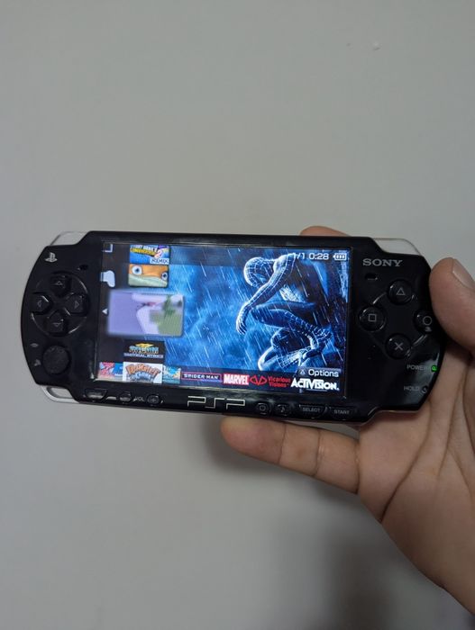 Psp 2004 modat cu jocuri card 64gb