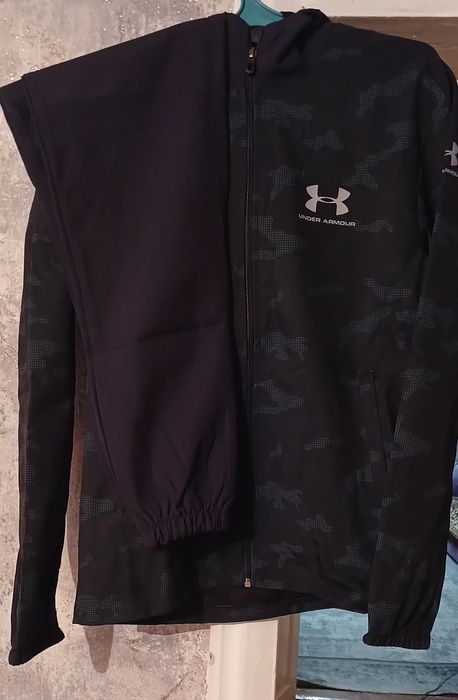 Спортивные костюмы новые