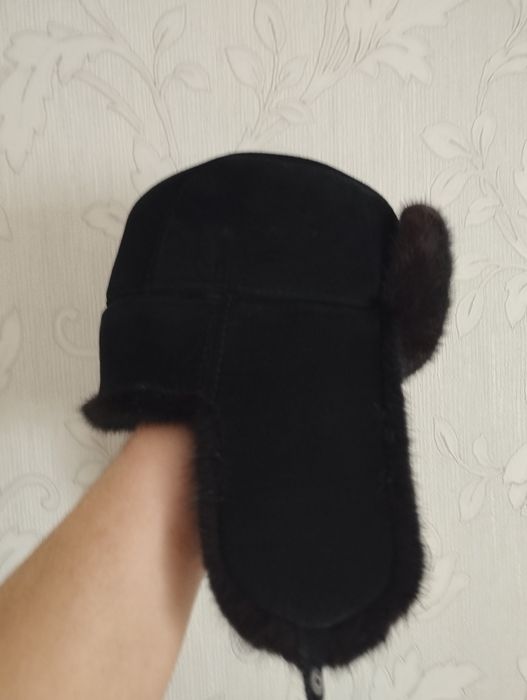 Продам норкавый шапку