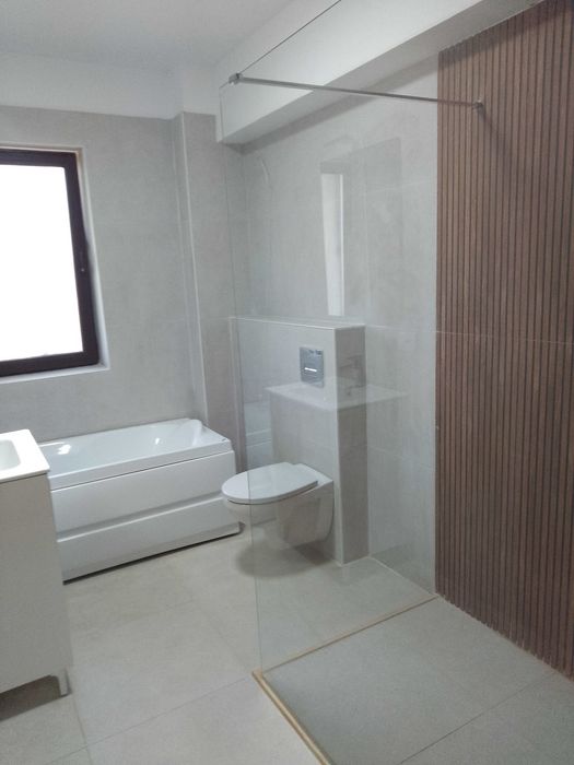 Închiriere apartament, confort de casă cu grădină privată