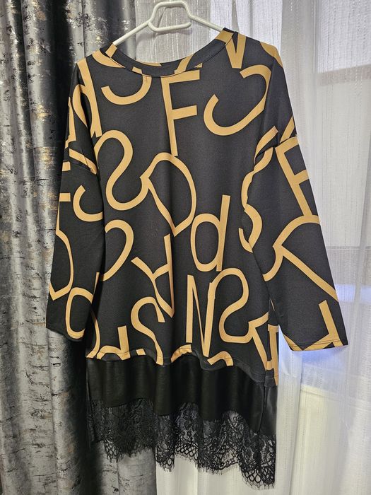 Rochie neagra cu piele ecologica în partea de jos. S, M, L