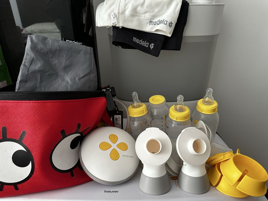 Бебешки принадлежности помпа за кърма Medela MomCozy, раница Ergobaby , стерилизатор Philips Avent , везна , гимнастика Tiny Love , шишета Haakaa