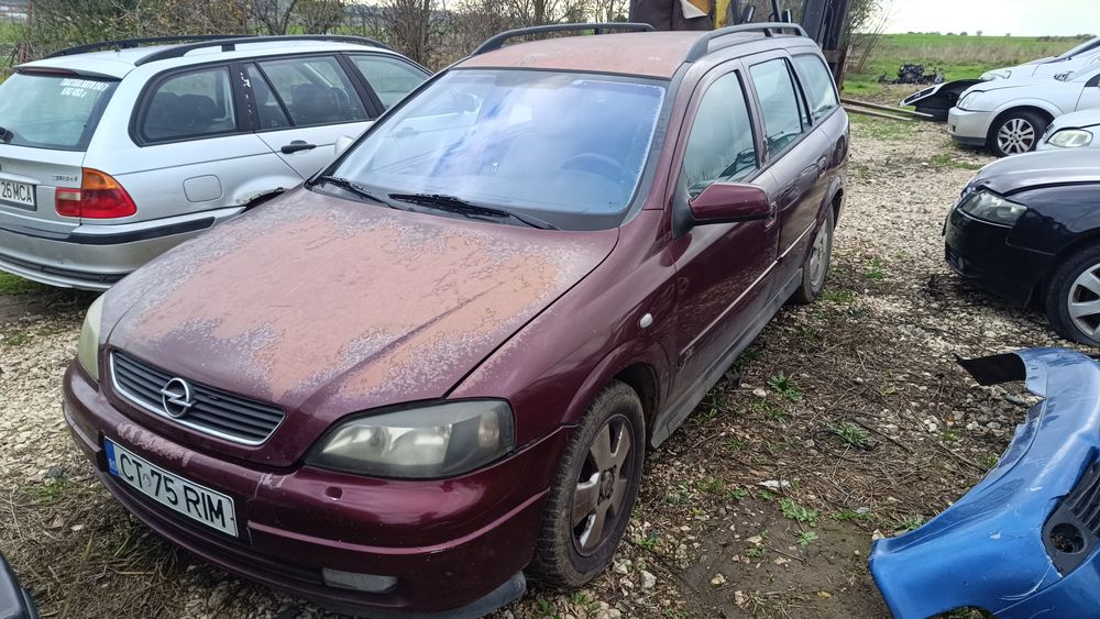 Faruri și triple Opel Astra G break 2003