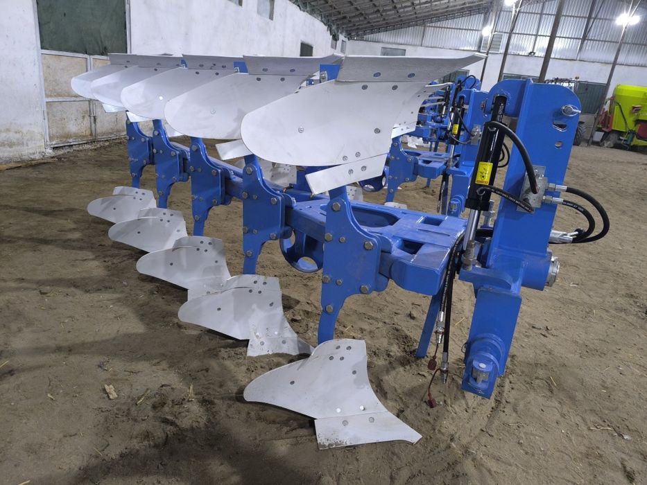 100 от Кучига молжаланган 5 корпусли айланма плуг